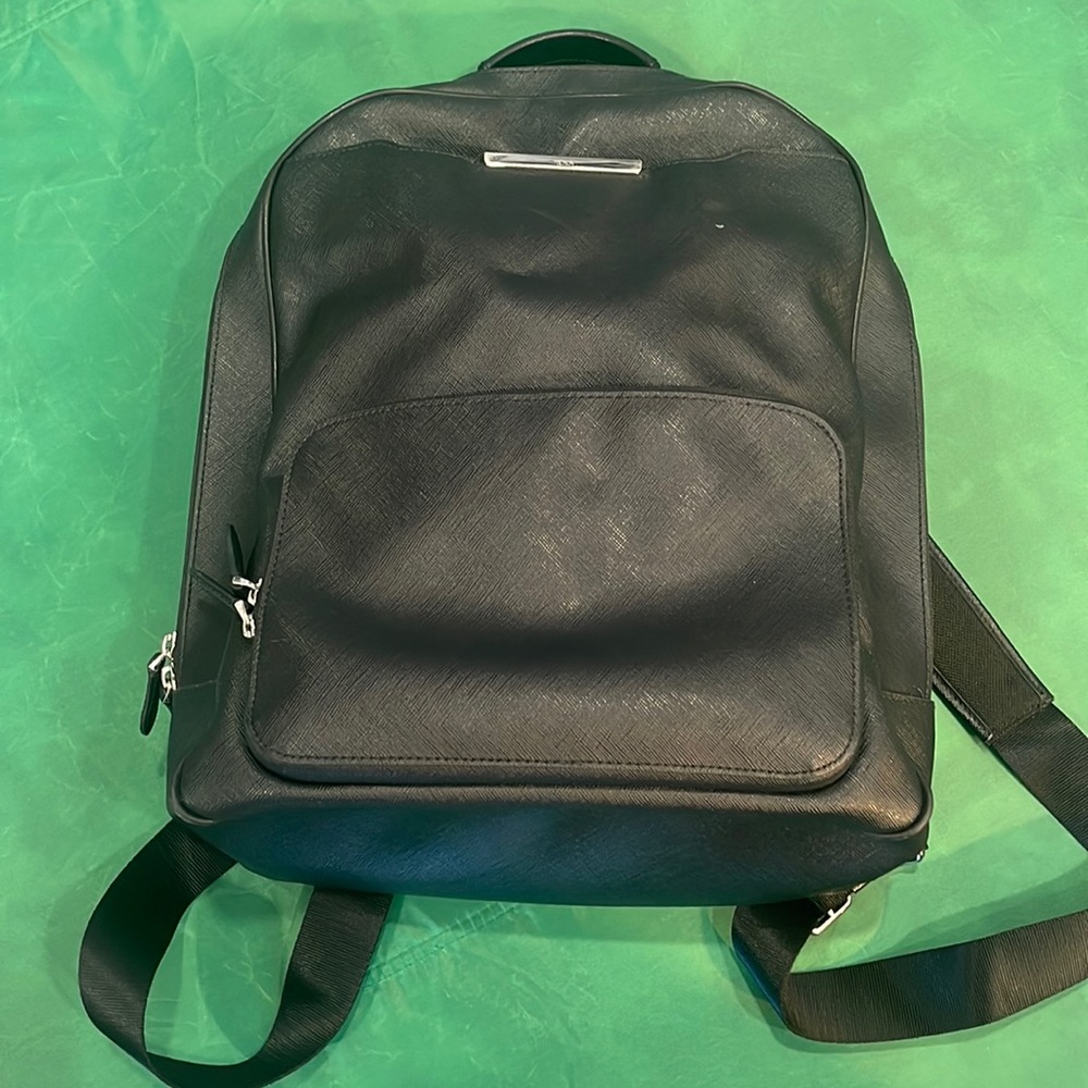 Black Tumi Backpack perfect for school or work!  Unisex!  Tons of storage!!